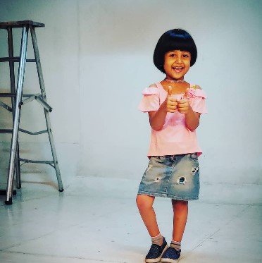 Baby Aazhiya during a photoshoot